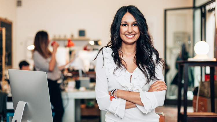 A photo of a woman smiling.